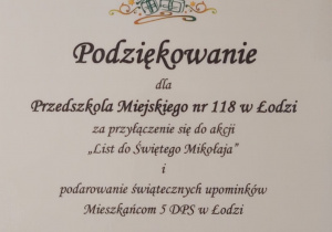 na zdjęciu znajduje się dyplom z podziękowaniami dla przedszkola miejskiego nr 118 w Łodzi za przyłączenie się do akcji List do Świętego Mikołaja i podarowania świątecznych upominków Mieszkańcom 5 DPS w Łodzi